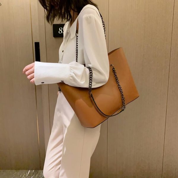 Leather Tote Bag. It is a high-quality luxurious Leather Shoulder Bag.