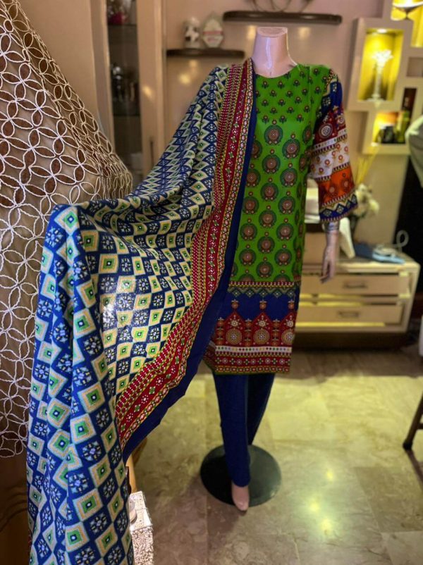 A 3-Piece stitched, peacock colored article Morni from our Festive Eid Collection 2022.