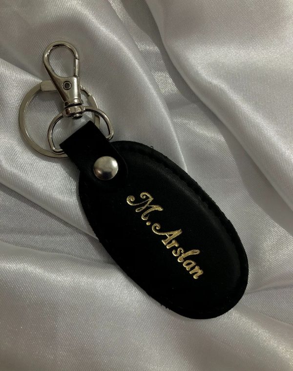 Black Oval Leather Keychain with Customized Golden Name Engraving