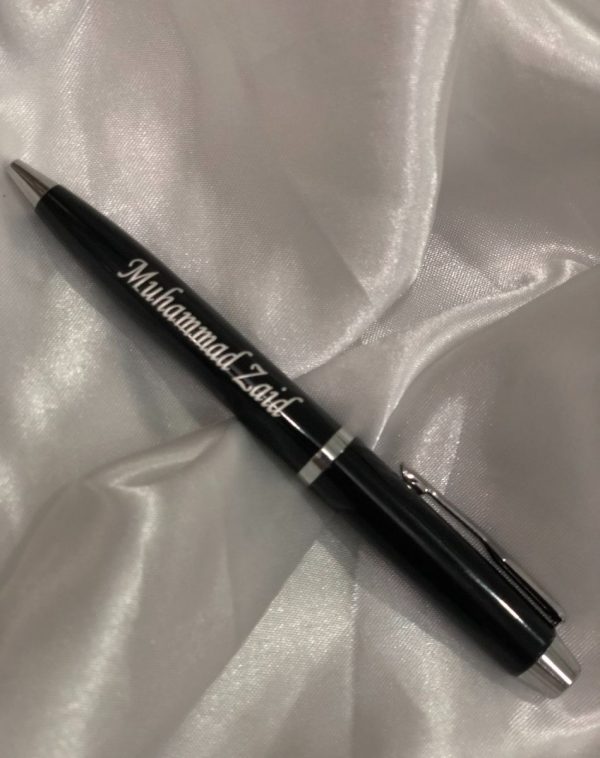 Black Metal Pen with Customize Silver Name Engraving on a White Background