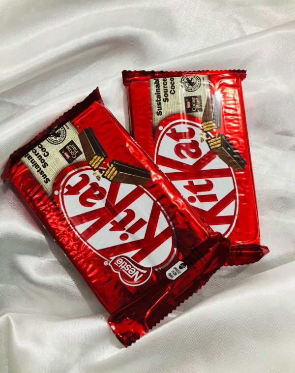 A close-up photo of a Pair of KitKat 4 Bars Imported Chocolates, arranged on a white background.
