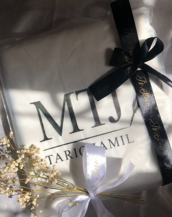 White Color Branded Unstitched Suit with MTJ Brand Bag, Black Ribbon, and Fresh Baby's Breath Flower Stick