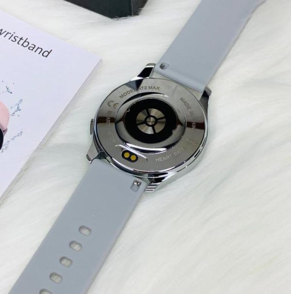 "AT-2 Max Smartwatch featuring elegant grey strap and black dial, displayed against a white background to reveal its stylish design.