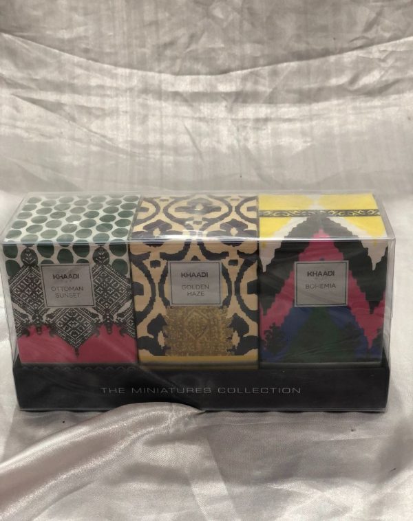 Captivating 3-Piece Khaadi Perfume Set for Her on White Silk Background.