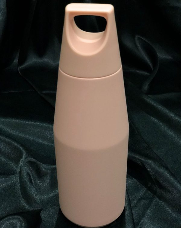 The Zen Flask in Baby Pink, a 580ml stainless steel water bottle with a sleek design and convenient handle.