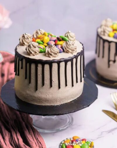 Chocolate Bunty mini cake topped with bunties and chocolate drizzle from J’s Store