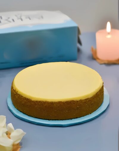 N.Y Style Cheese Cake - Classic baked cheesecake with biscuit base from J’s Store in Karachi