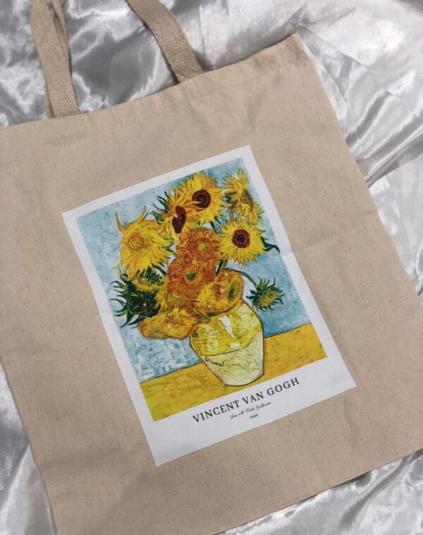 Art Lover's Aesthetic Tote Bag featuring Vincent van Gogh's "Sunflowers" on a canvas bag.