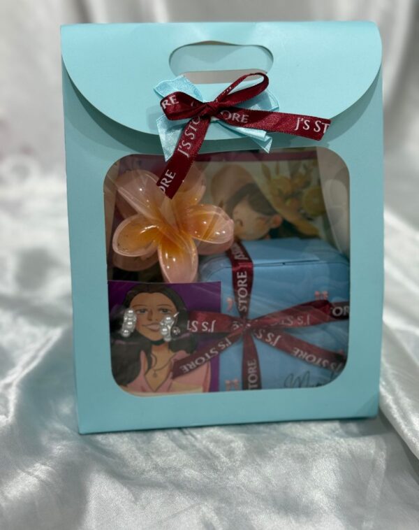 Contents of the Personalized Mini-Treat Gift Bag laid out, including a personalized organizer and photo frame.