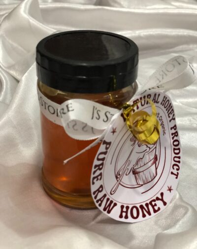 Organic Honey Jar from J’s Store with a custom label, tied with a white ribbon.
