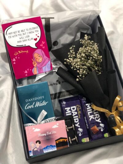 Eid, From Afar Box is a luxury Eid Gifts Boxes For Him from J’s Store featuring a black J. suit and Davidoff Cool Water.