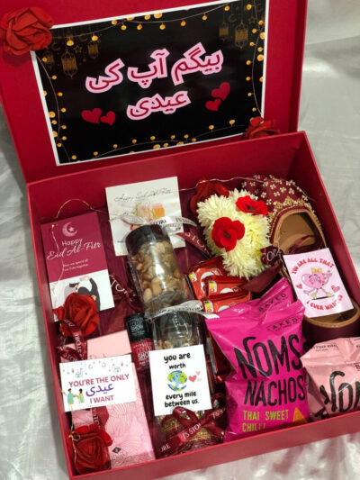 Eidi for My Queen is a luxury Eid Gift Boxes For Her from J’s Store featuring a 3-piece suit and Pink Blossom perfume.
