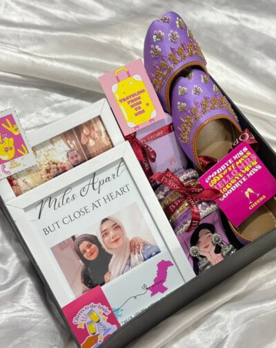 Besties Beyond Borders Box from J’s Store featuring lilac khussas, jewelry organizer, and ethnic bangles.