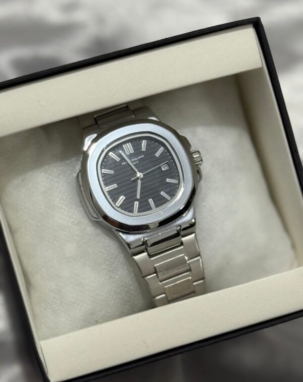Executive Octagon Steel Watch with a metallic finish.
