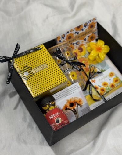 The Sun-Kissed Elegance Box from J’s Store featuring Marc Jacobs Honey perfume and sunflower accessories.