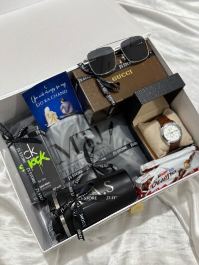 The Luxe Gentleman Collection by J’s Store featuring One Shock perfume, unstitched suit, and SuperSport watch.